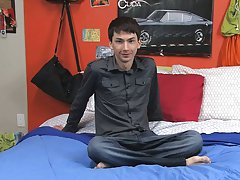 Colby London is sitting in bed giving an interview after having filmed a fuck scene gay sex black twinks